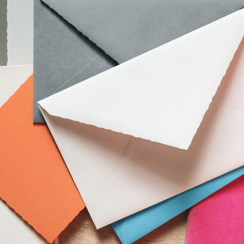 Various colors envelopes and greeting card on the table